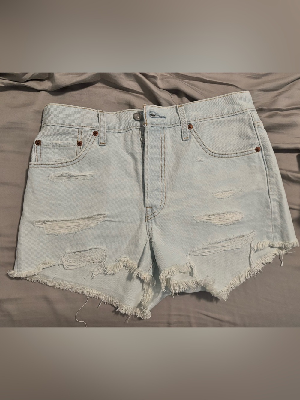 Levi’s 501 Light Wash Distressed Denim Shorts